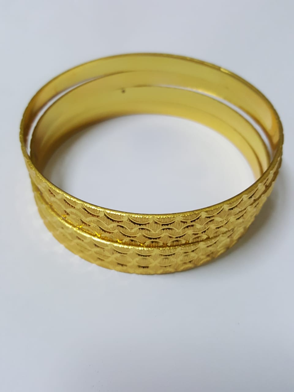Imitation bangles/Indian make. Long.lasting shine. With a set of 4 pc
